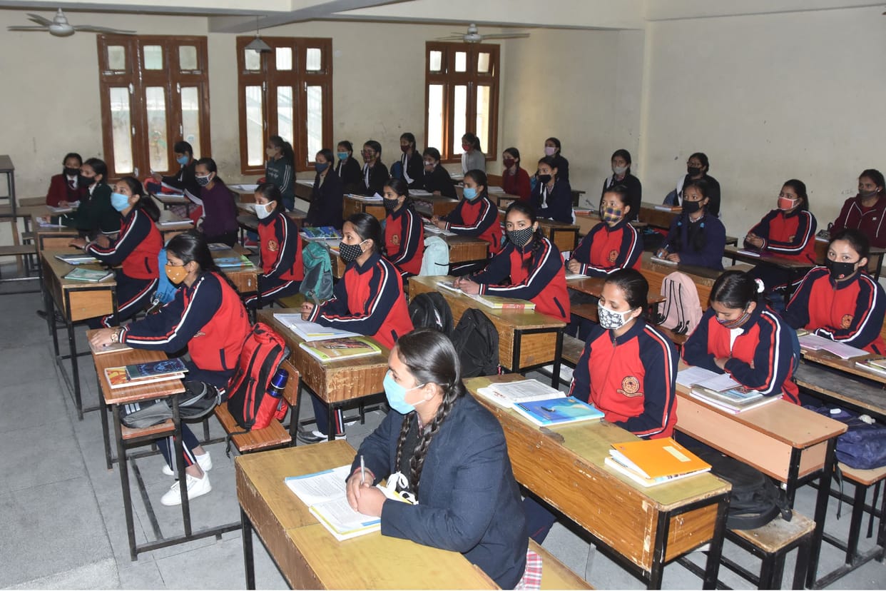 students arrived school after long time, looked exicted