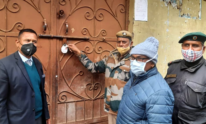 Building sealed in Hyatt Colony after not paying tax