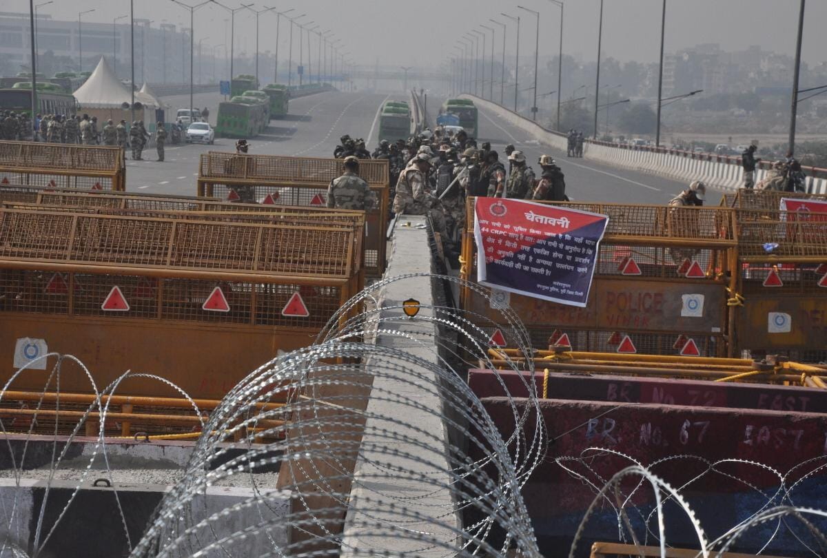 kisan andolan Ghazipur border high level security iron wire fencing and sharp needle on roads to stop farmers from entering delhi see photos