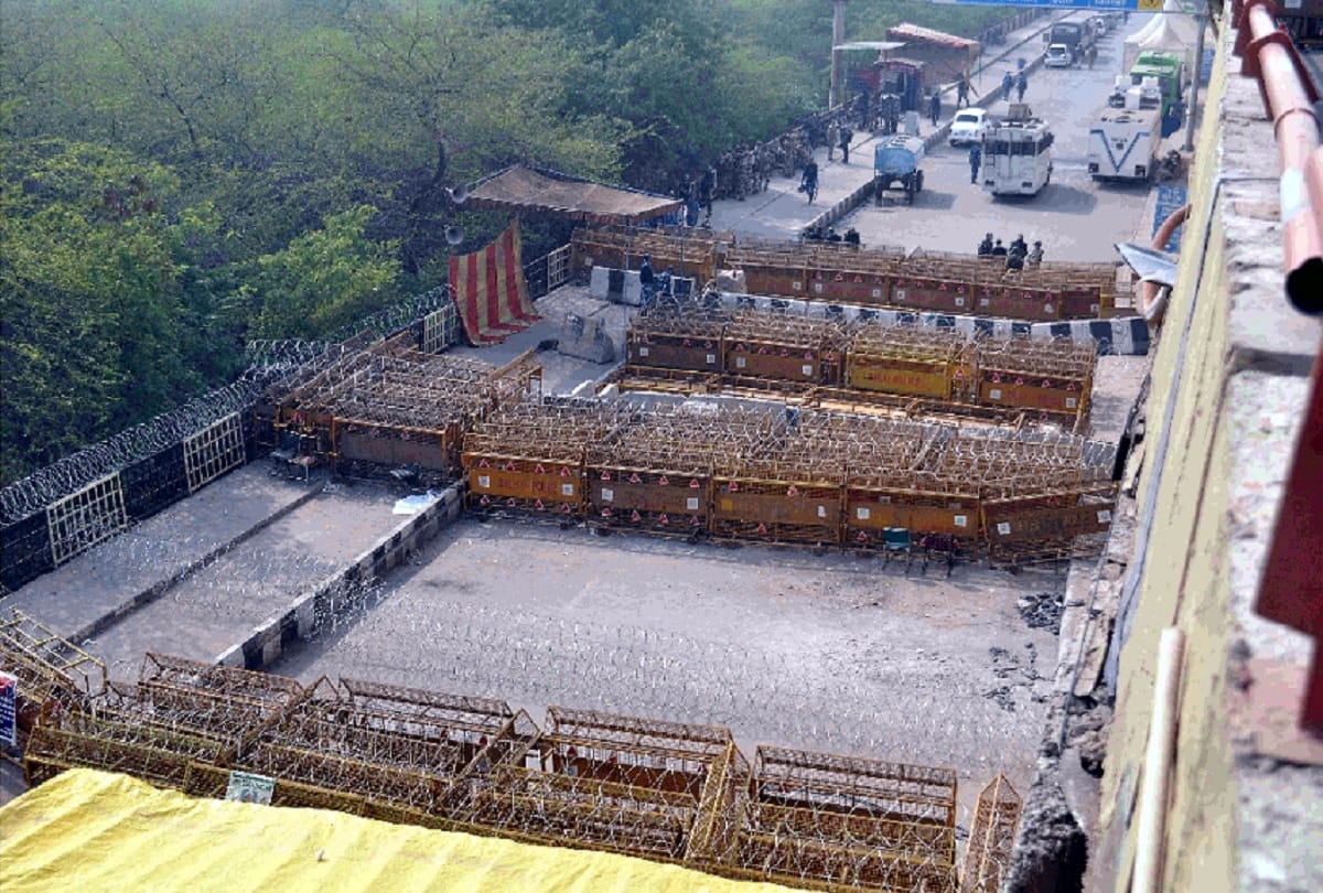 farmers protest delhi Concrete walls being built between the five level jersey barrier on the Singhu border kisan andolan delhi see photos