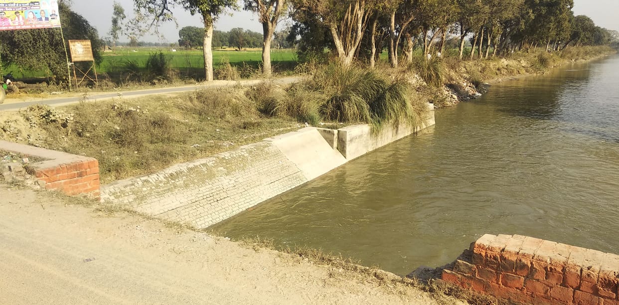 Canal bridge boundary broken, traffic hazard