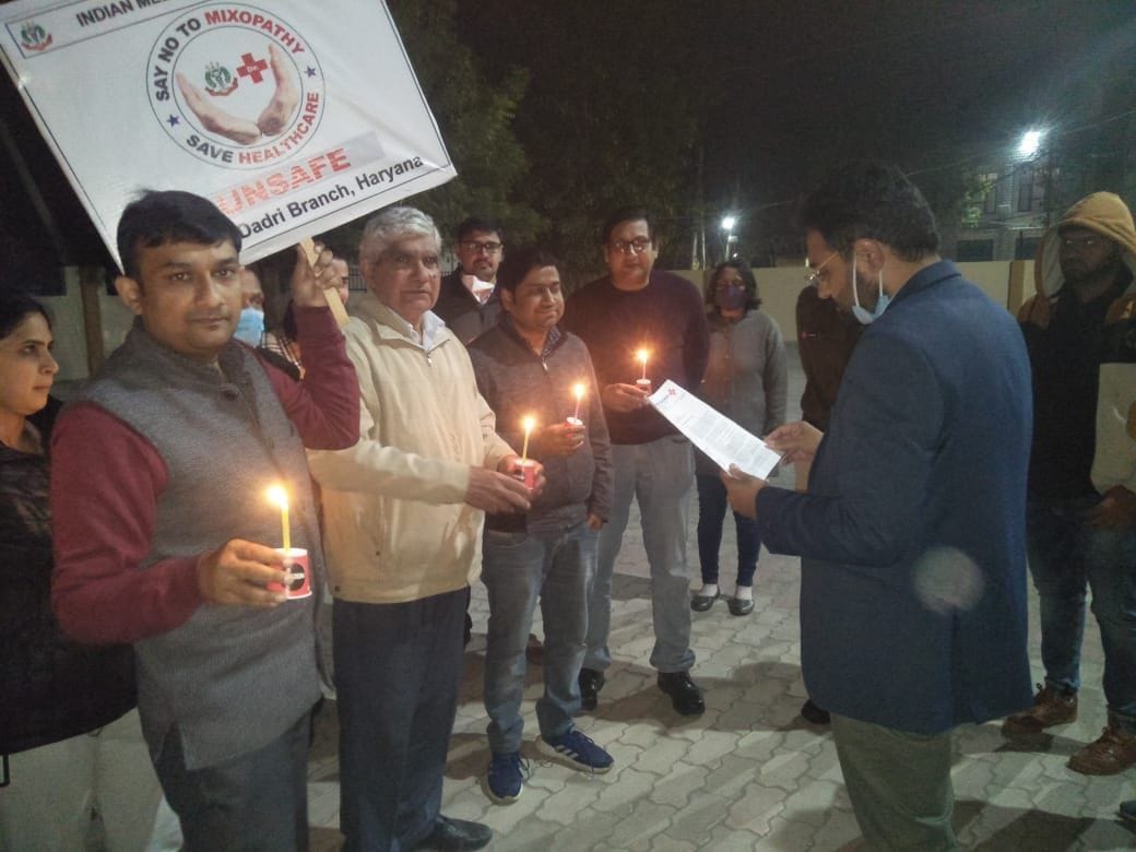 Physicians took out candle march in protest against mixpathy