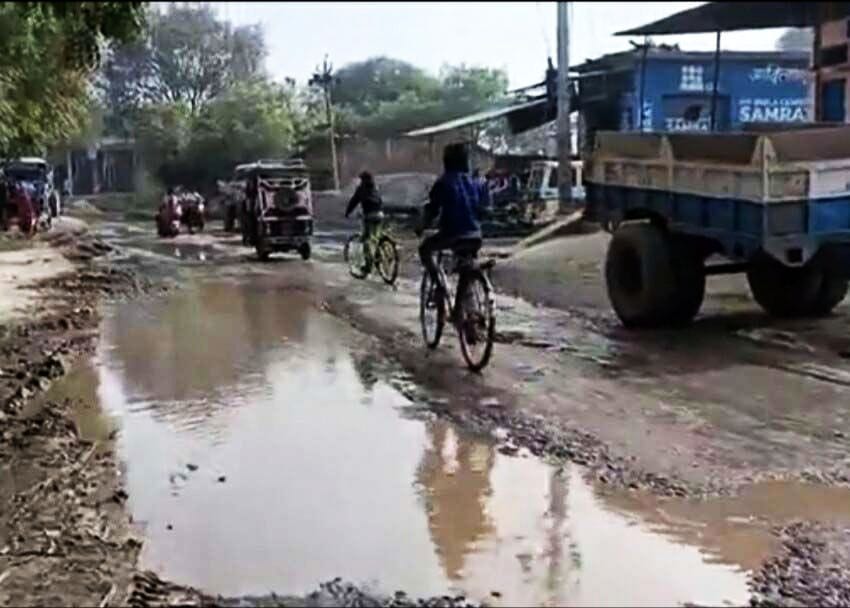village,road,truck,high alert,man