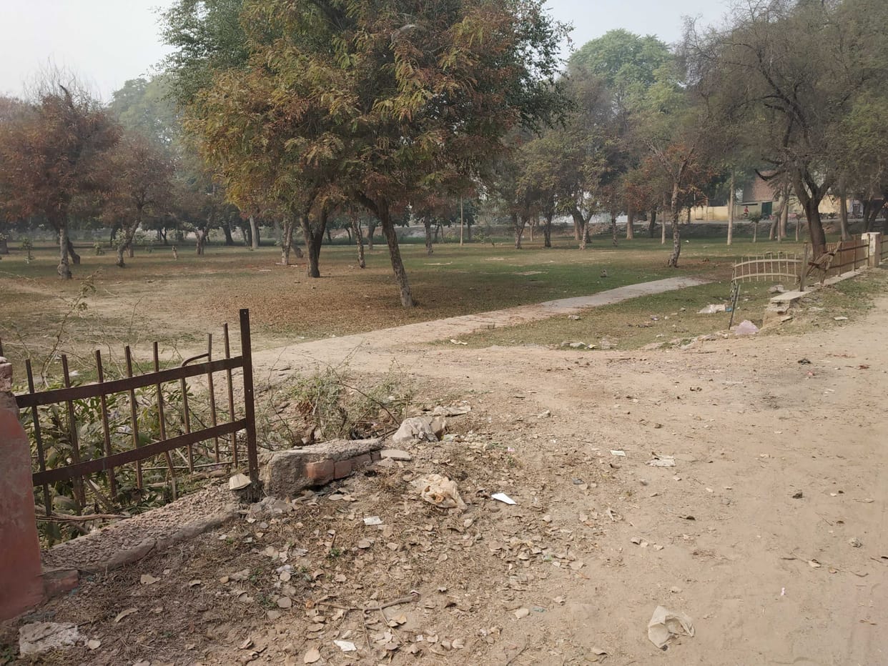 Walls broken, trees also dried and garbage dumped
