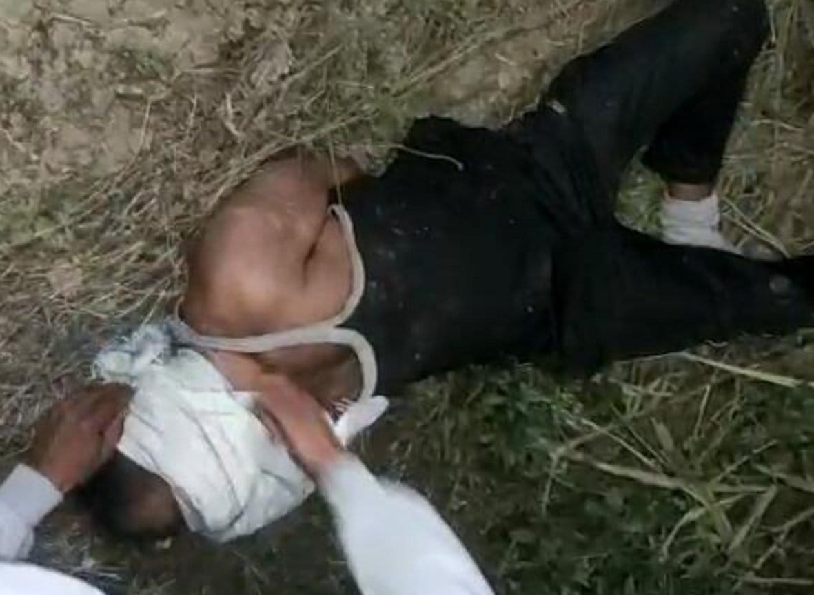 Tie hand and put young man in sugarcane field