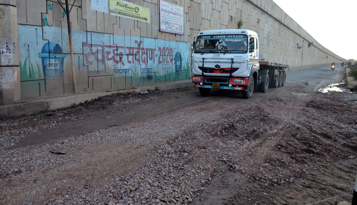 The work of filling  pit on Agra Road