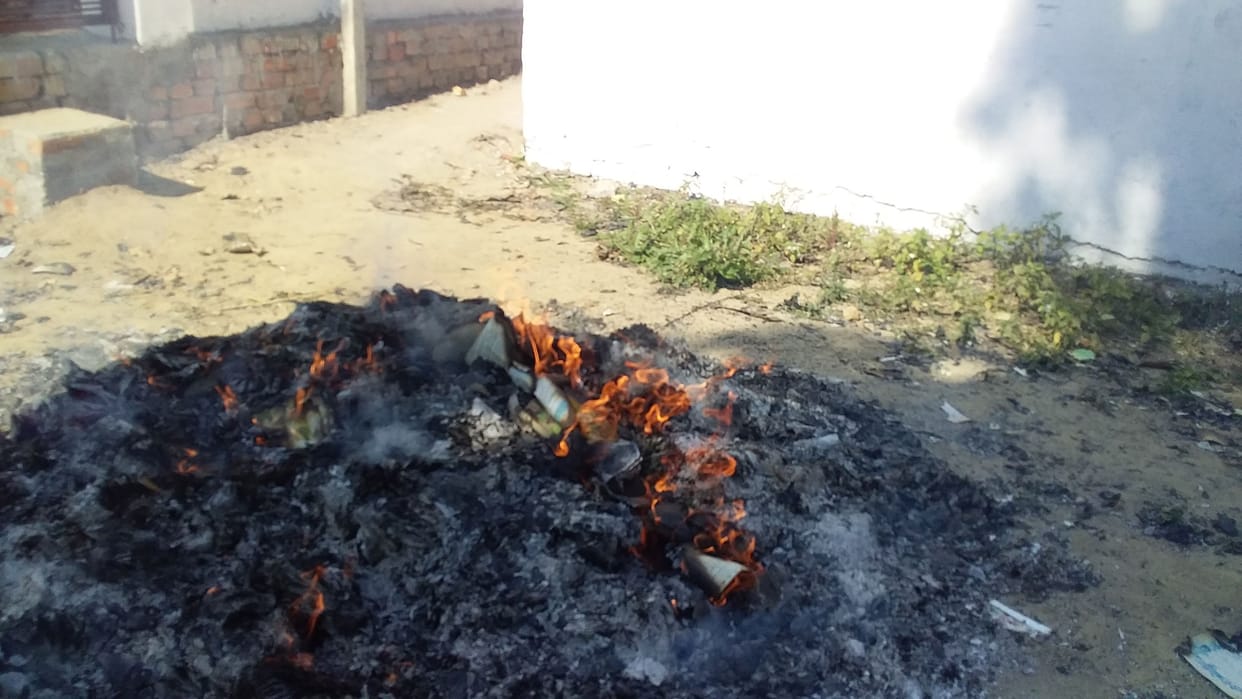 Government books burned instead of distributing children