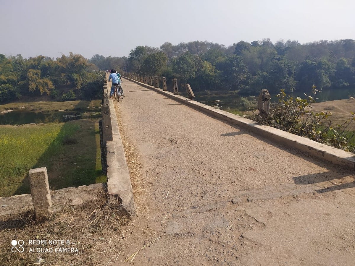 Student riding a bicycle fell from the bridge going to school in chandauli up