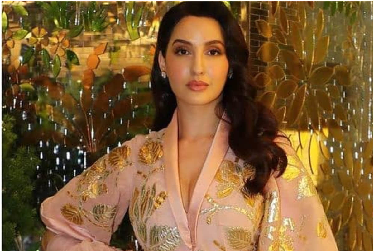 nora fatehi look breath of fresh air in white midi crochet dress