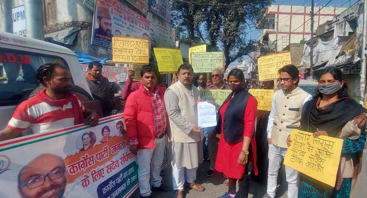 Protest against removal of dividers from medical road
