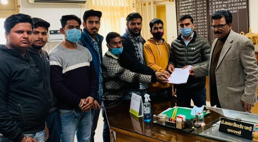 Demand to take action against associate professor