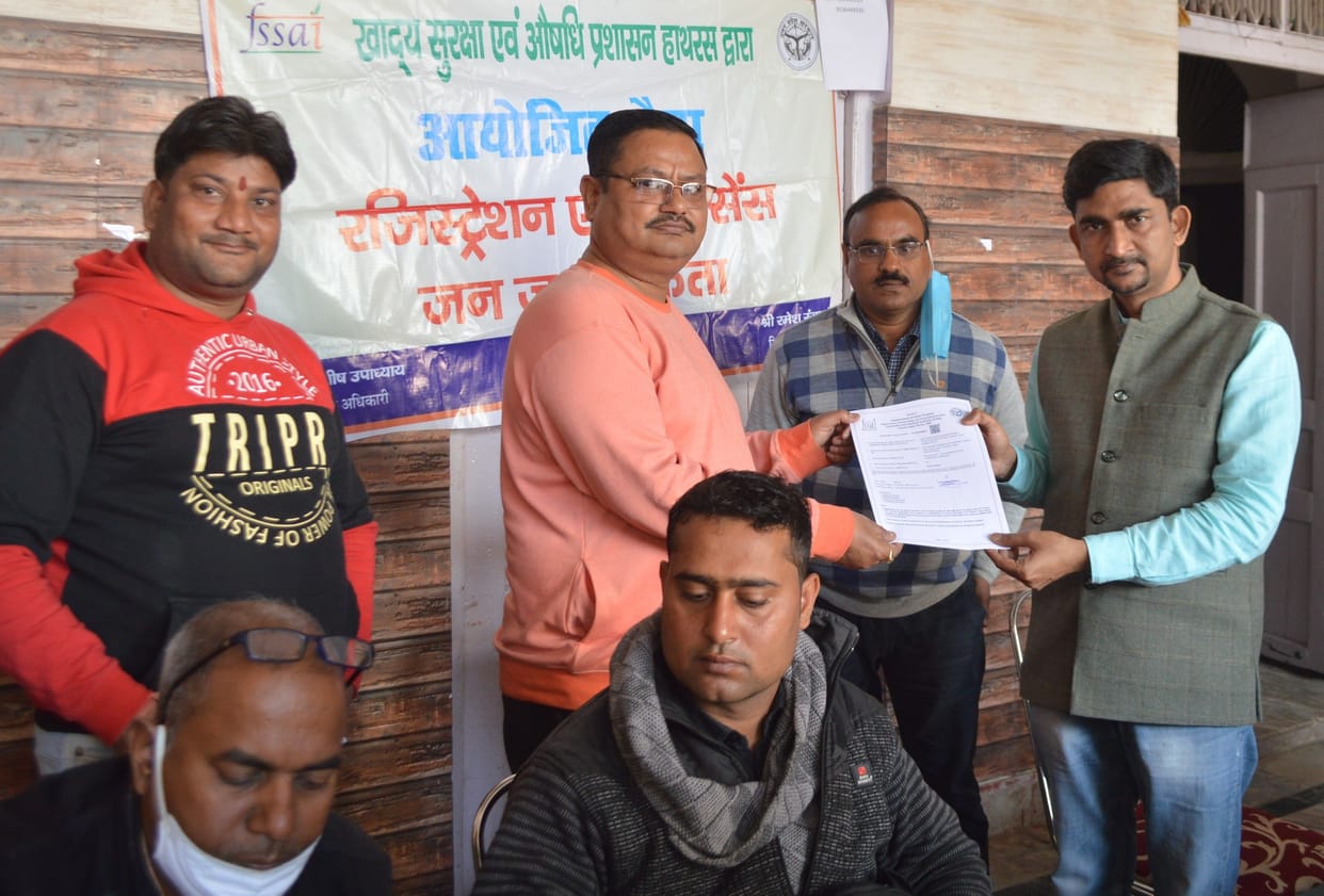 businessman done registration in food department camp