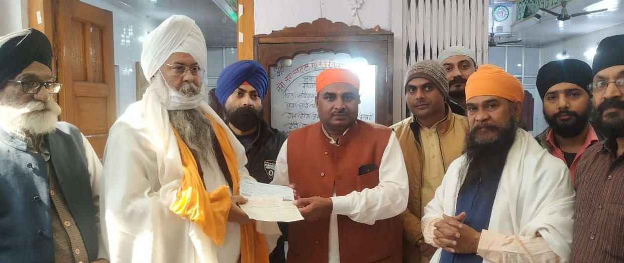 Gurdwara Management Committee gave dedication amount of 1.11 lakh for construction of temple
