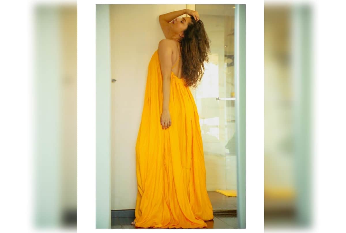 ankita lokhande post pic in yellow backless maxi dress fans gushing over it