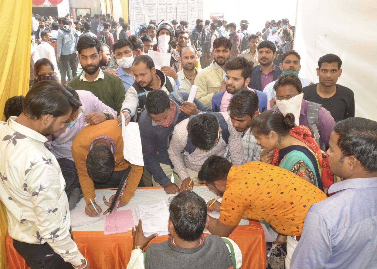 Crowd of unemployed youth in employment fair
