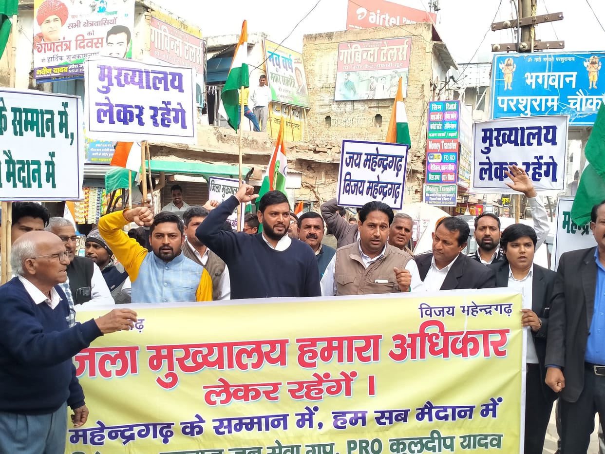 Foot march in the city for district headquarters, including tractor
