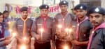 केएनपीजी कॉलेज में पुलवामा के शहीदों की याद में कैंडल जलाते रोवर्स-रेंजर्स। संवाद