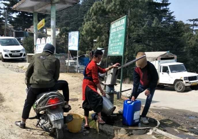 Compulsion to carry water with hand pump and nozzle