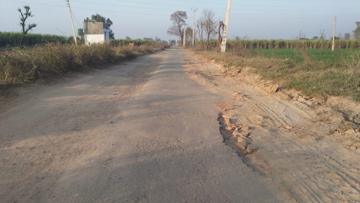 Villagers are passing through a broken road for four years