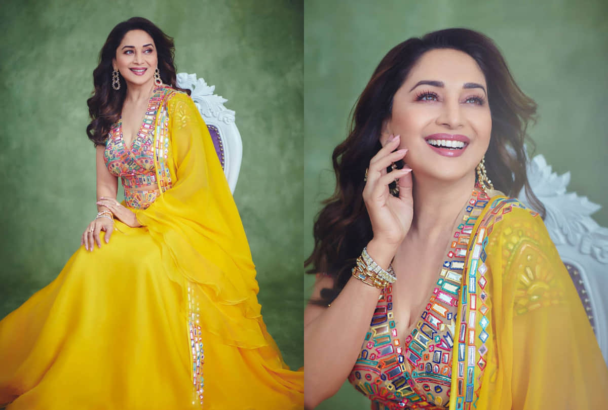 Madhuri Dixit add glam with a shimmery sheer silver saree with a multicolor blouse for dance diwane  dance diwane