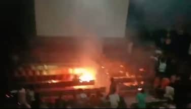 Audience bursts firecrackers during the screening of Salman Khan-Shah Rukh Khan's 'Karan Arjun' in Malegaon
