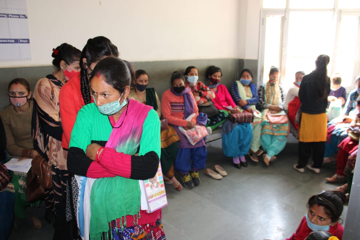 Women sitting on the cold floor for four hours waiting for the doctor