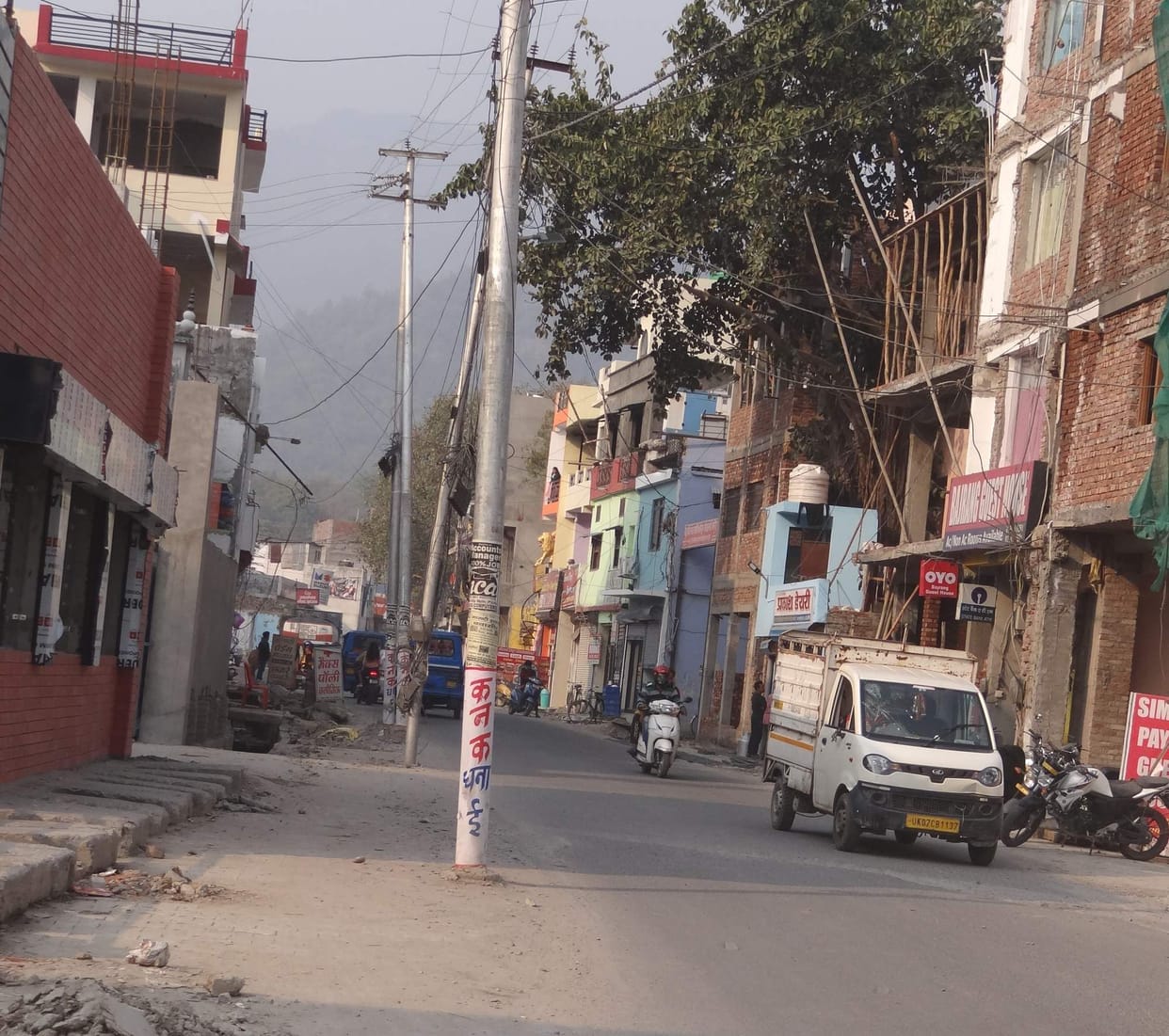 Electric poles came in the middle of the road