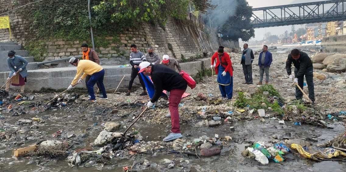 Red Cross and Phad Committee cleaning Bhagirathi drain