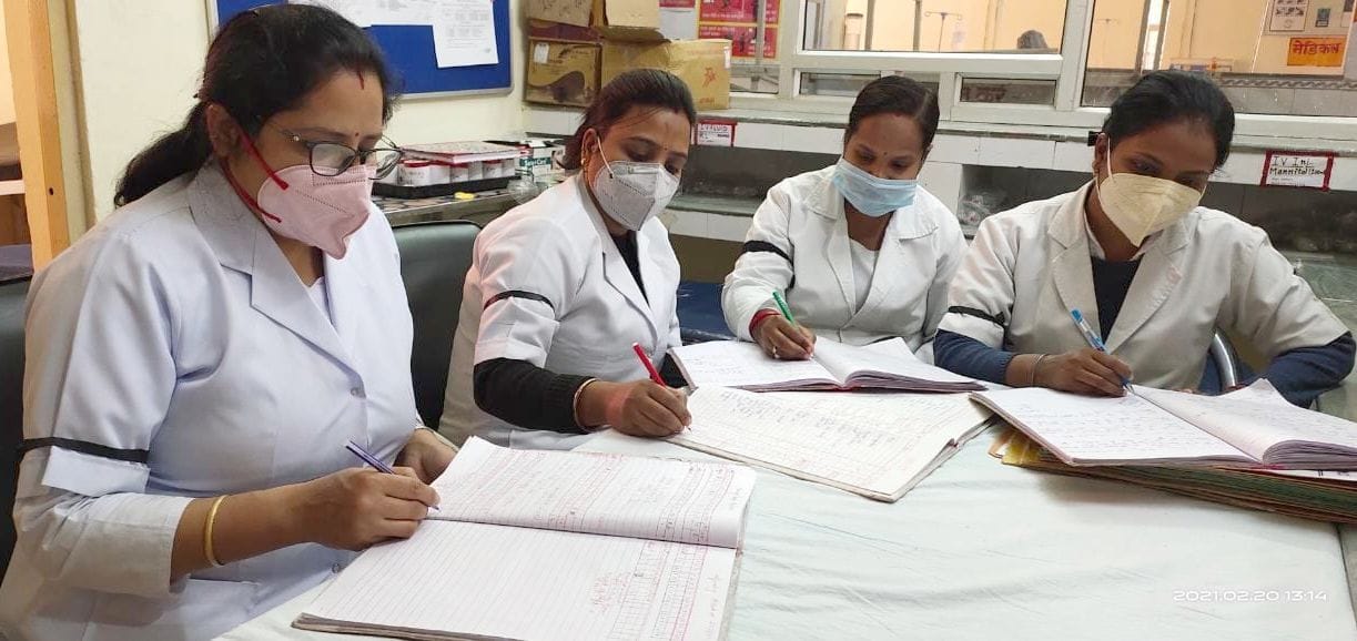 Health workers protest against the black band