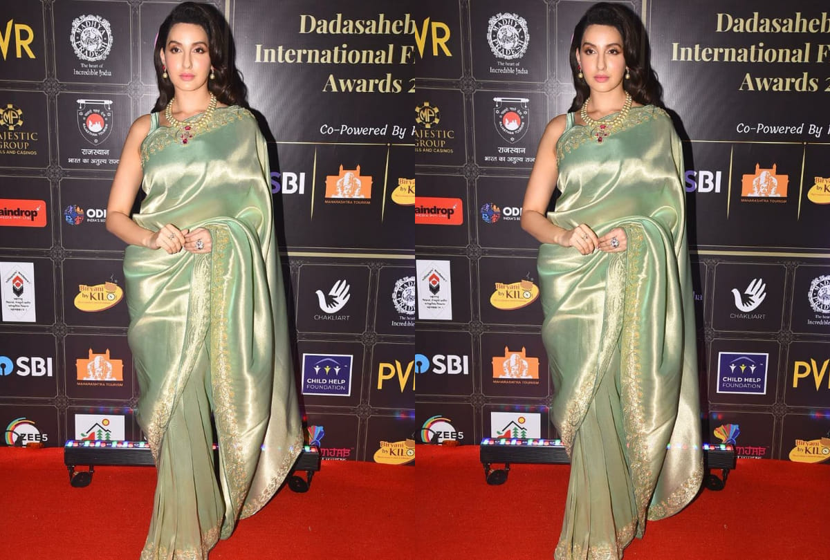 nora fatehi look resplendently gorgeous in green beaming silver silk saree in dadasaheb phalke award 2021