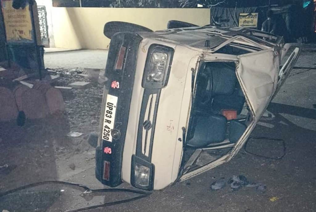 Uncontrolled car overturned after colliding in stones placed in front of hut, big accident averted
