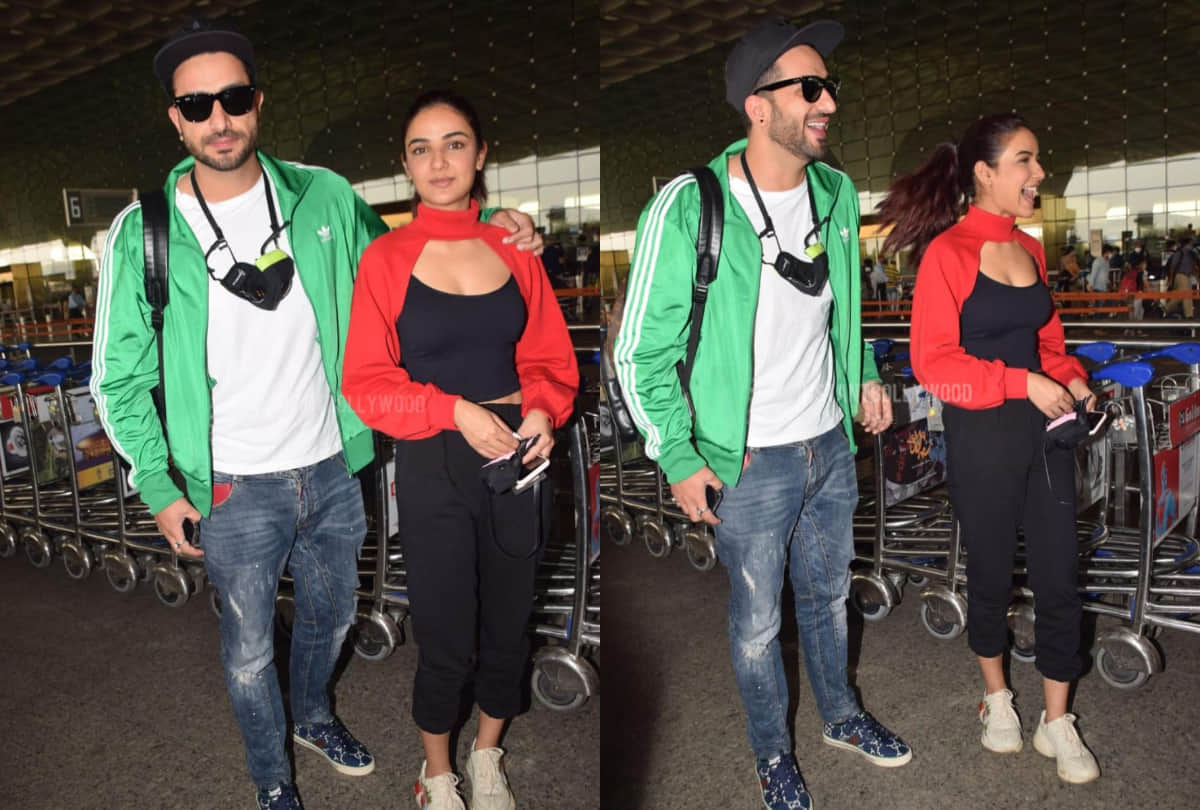 Bigg boss 14 contestants Aly Goni and Jasmin Bhasin spot in airport go for Kashmir Jasmin wear red arm warmer sweater