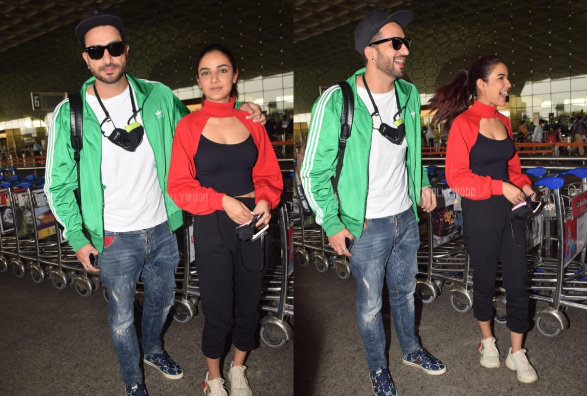 Bigg boss 14 contestants Aly Goni and Jasmin Bhasin spot in airport go for Kashmir Jasmin wear red arm warmer sweater