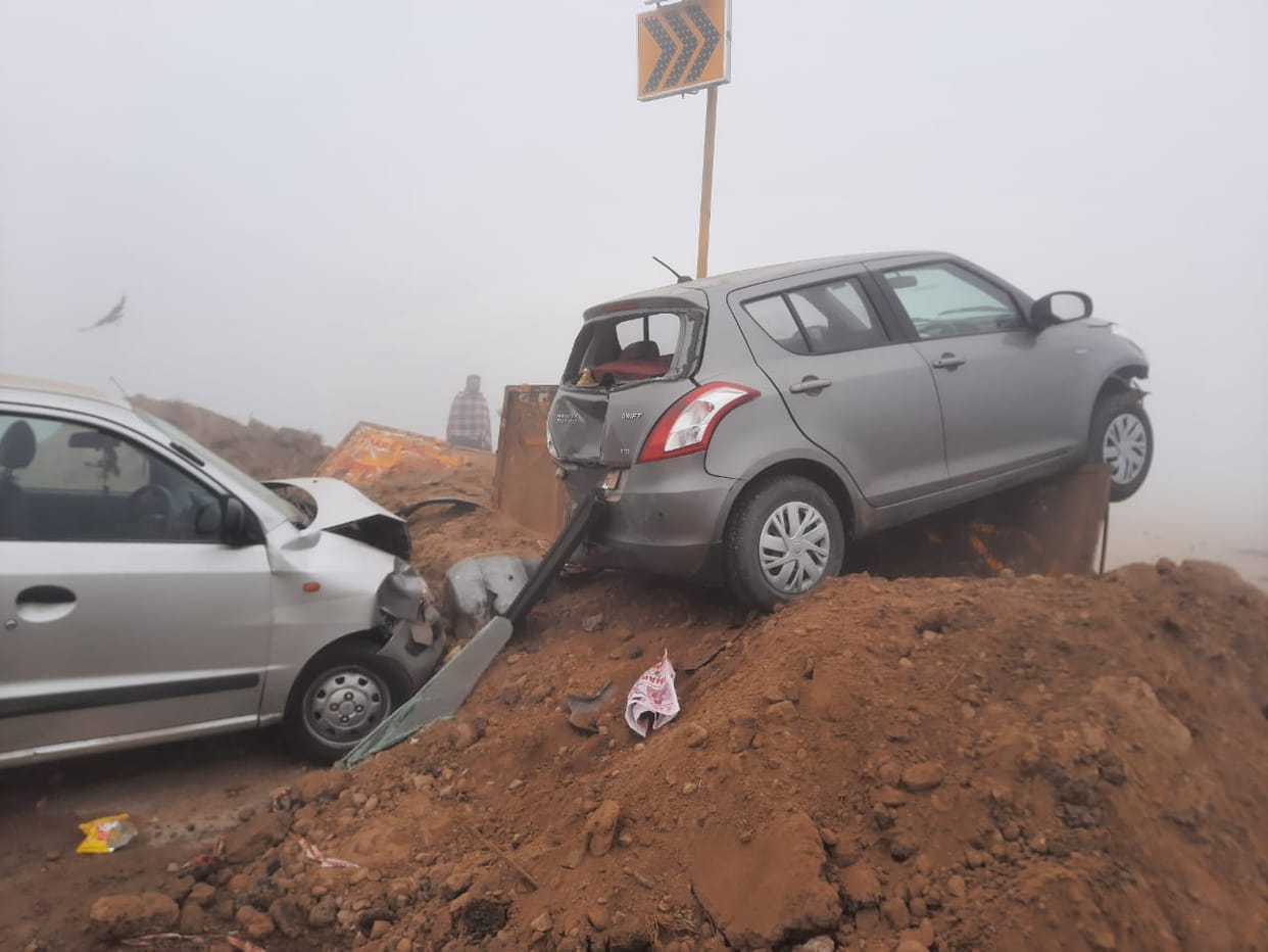Three vehicles damaged after colliding with a pile of mud lying on the road