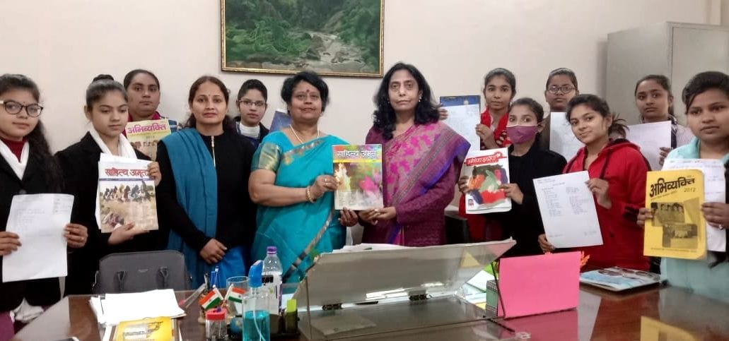 Girl students put on exhibition of magazines