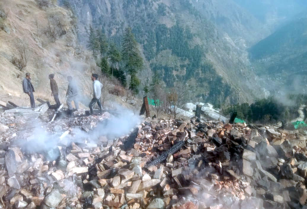 Smoke rising from the house on the second day in sari village