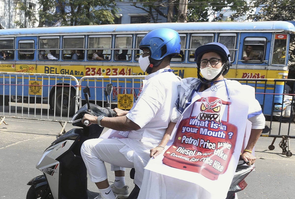 West Bengal Election 2021: CM Mamata Banerjee travels on an electric scooter in Kolkata protest against fuel prices
