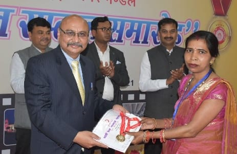 Two railway officials and 74 employees honored