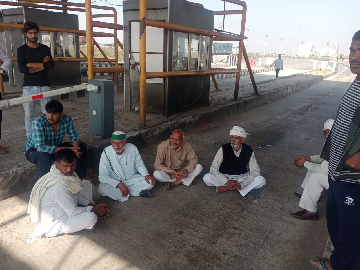Farmers sitting on strike in the middle of KMP toll