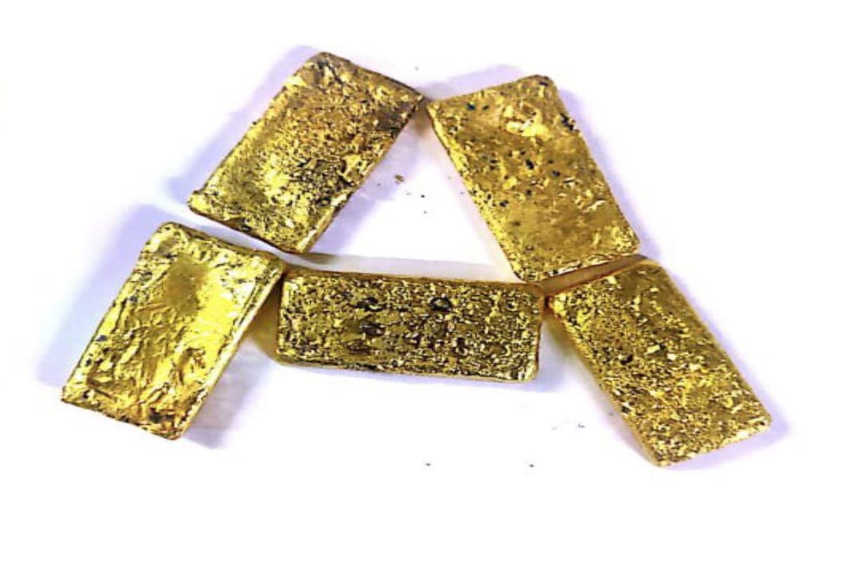 Delhi Airport Customs recovered one point five kg gold valued at Rs 65 lakhs 44 thousand concealed as chemical paste in toilet of aircraft arrived from Dubai on Feb 24