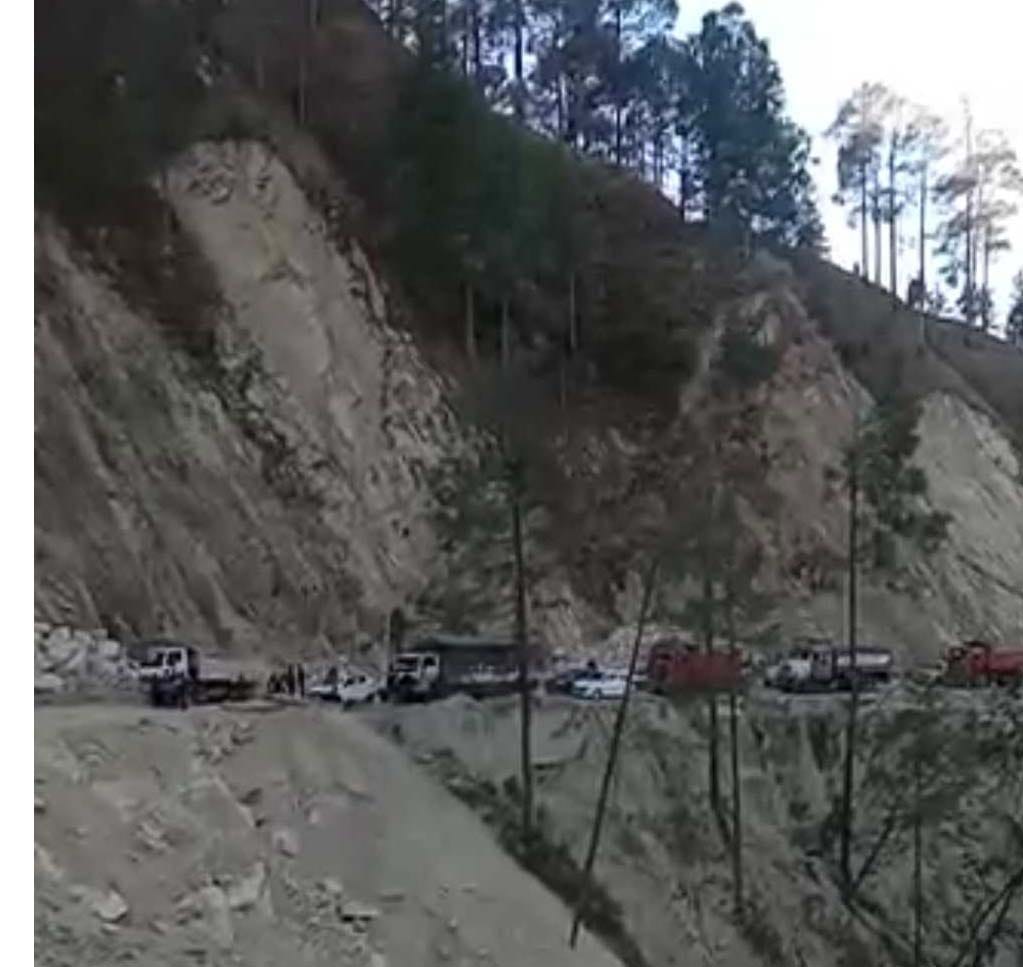 An hour jammed NH on Swanla near debris