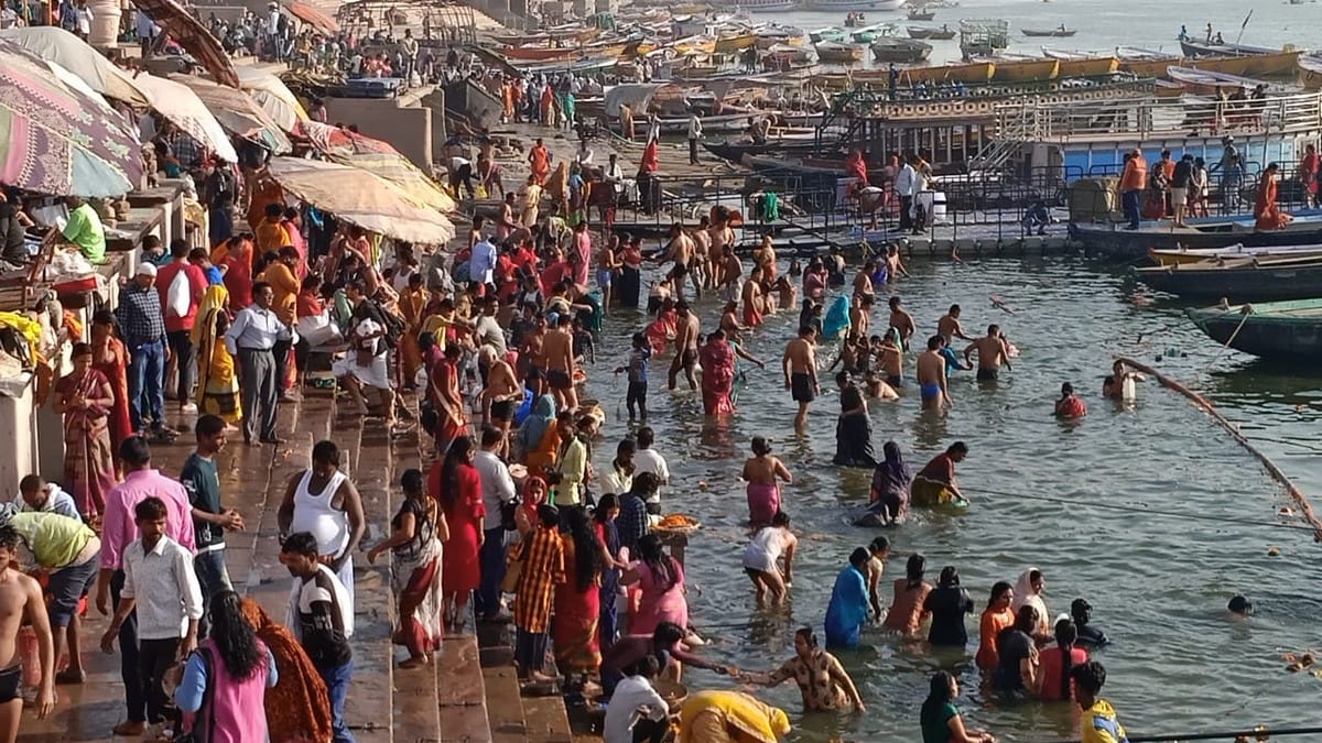 devotees dip in holy ganga on magh purnima in varanasi