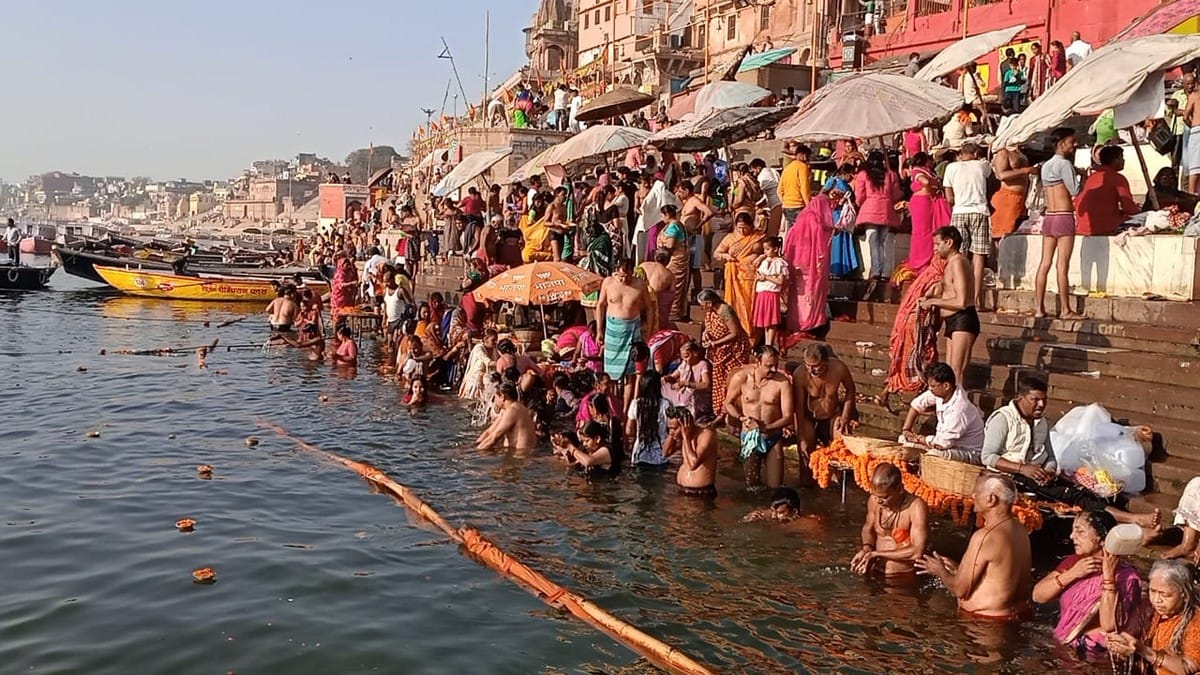 devotees dip in holy ganga on magh purnima in varanasi