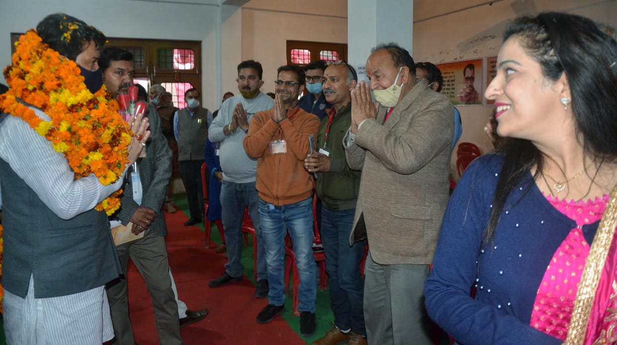 bjp worker tell the people govt policies .