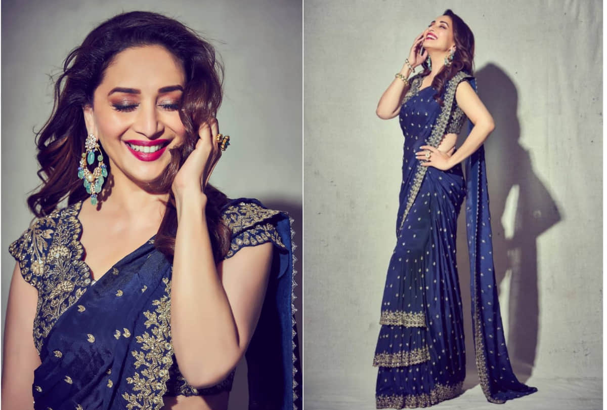 madhuri dixit shows blue hues in 98k arpita mehta ruffle saree