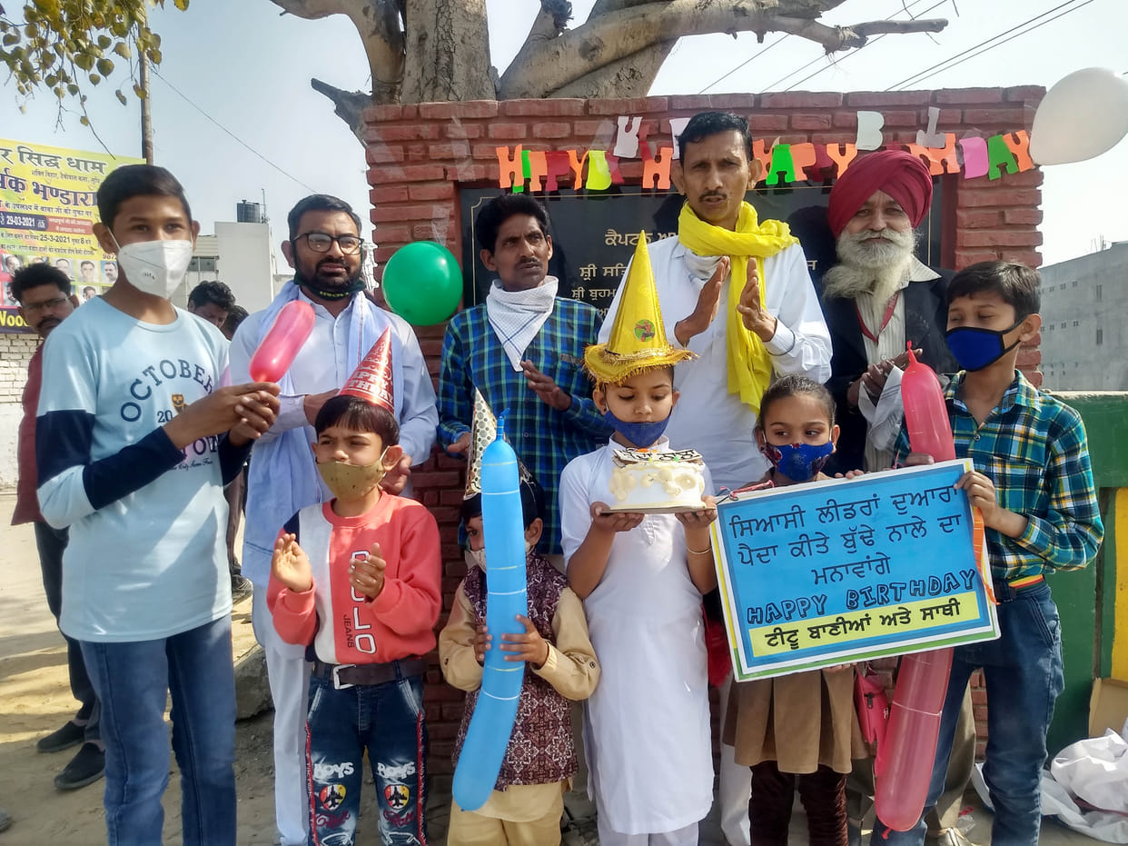 Comedian Titu Baniya cuts cake on the edge of Buddha river , Ludhiana