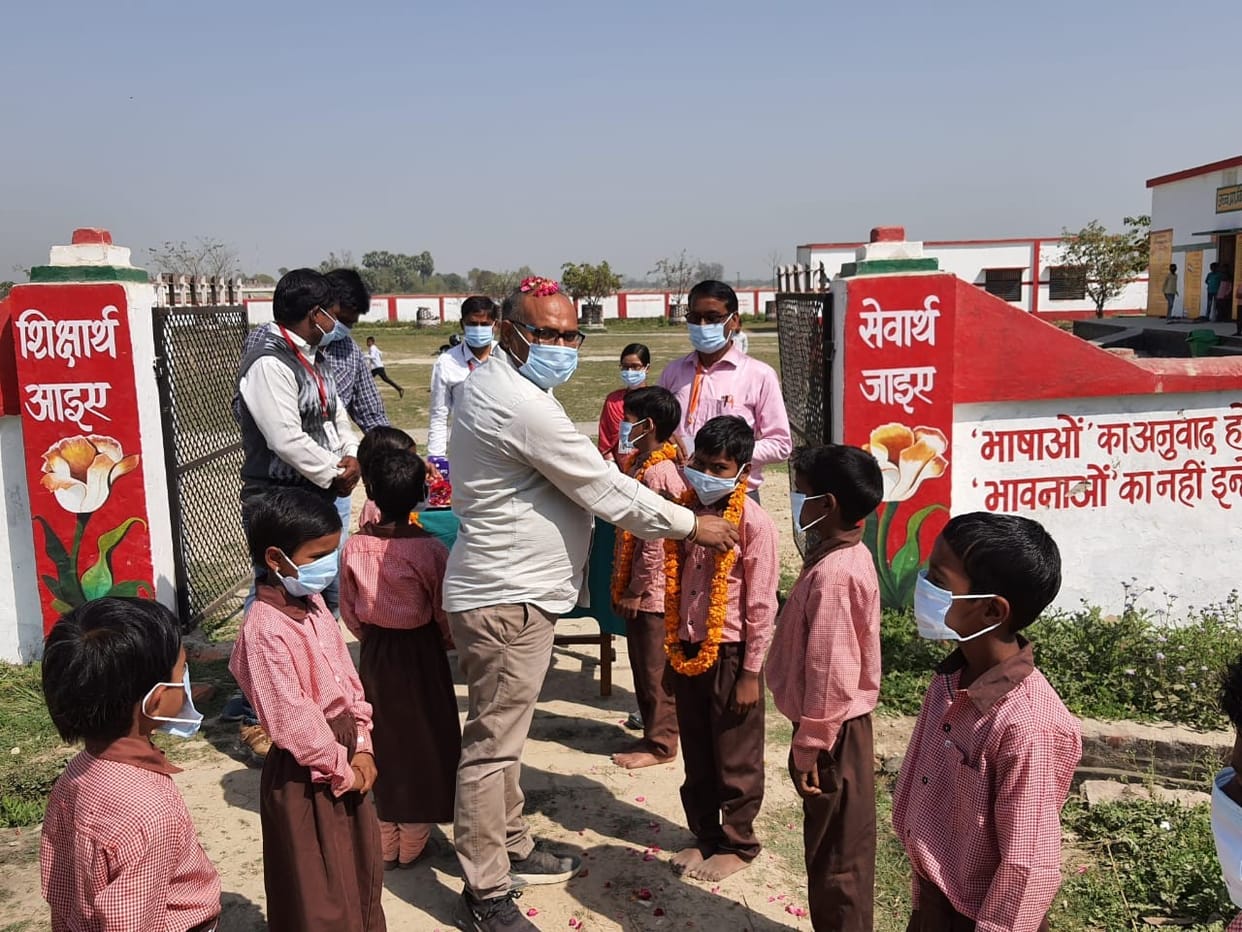 Children reached school, welcomed by applying tilak