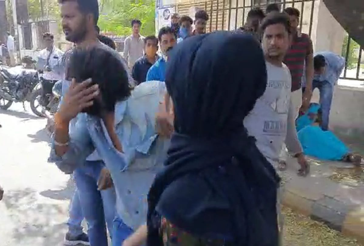 Girl beating car driver after hitting Scooty in jhansi