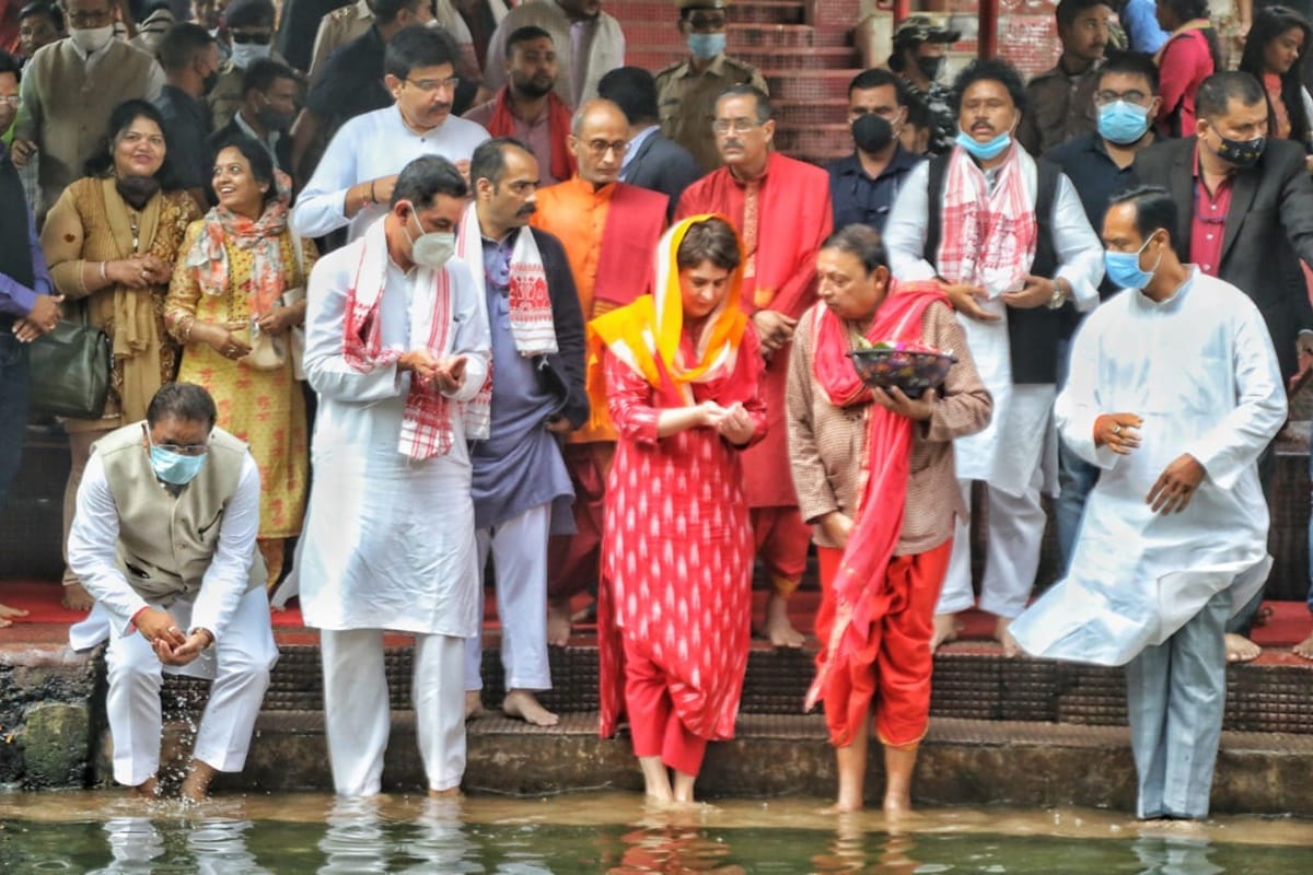 assam assembly election 2021 priyanka gandhi does pooja at kamakhya mandir dance with tribals unemployment congress bjp