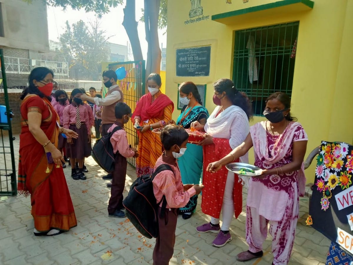 schools open after one year almost teachers welcome students in varanasi